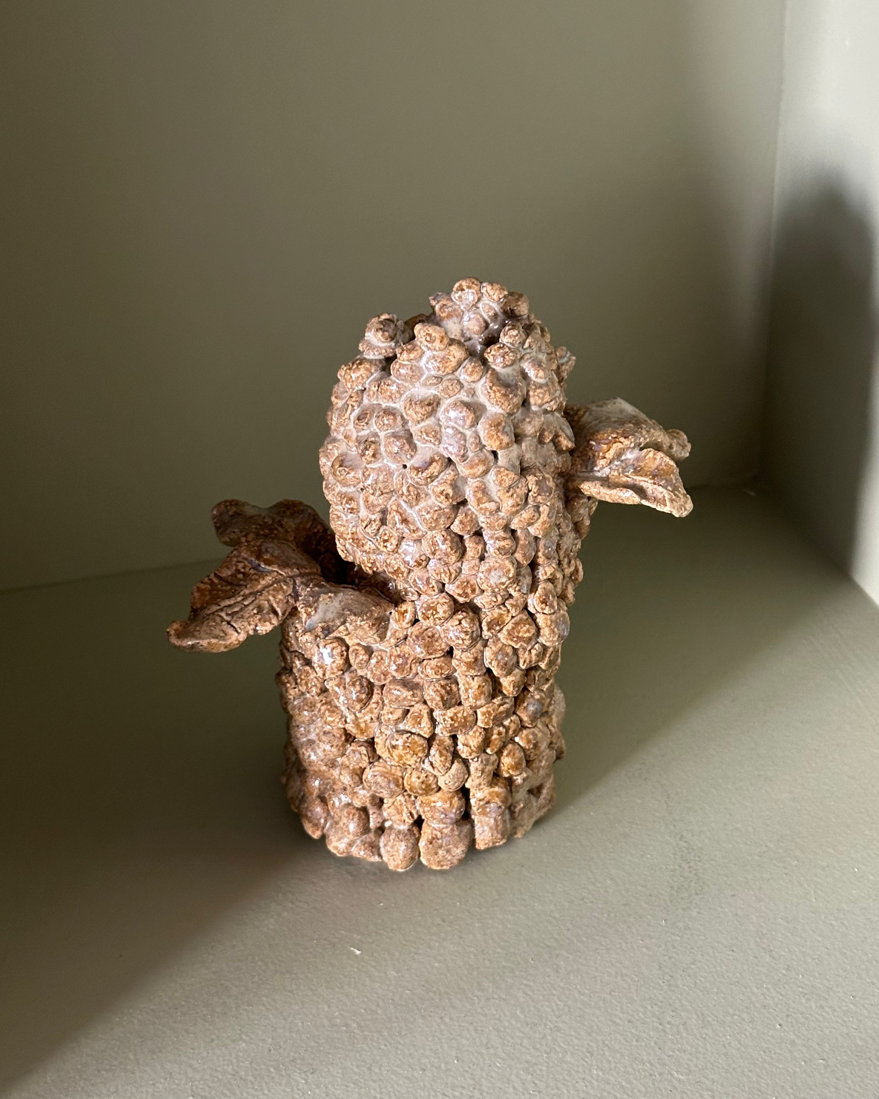 WINGED CANDLE HOLDER